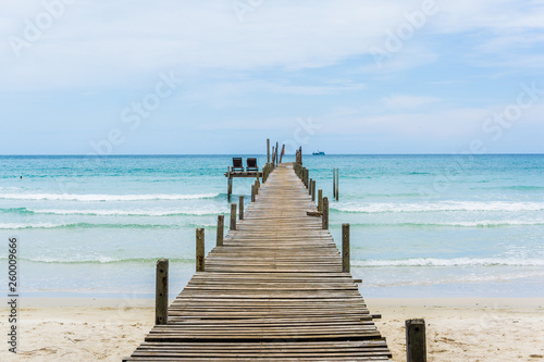 Wooden pier pathway to sea beach