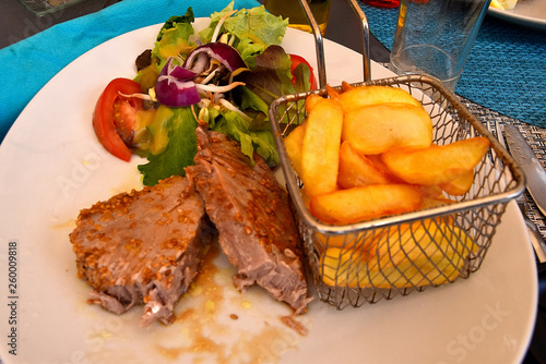 grilled tuna fish with potatoes and vegetables