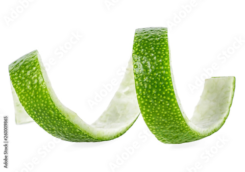 Fresh lime peel isolated on a white background. Lime twist. Lime skin.