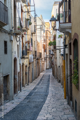 Narrow street in Tarragona, Catalonia, Spain