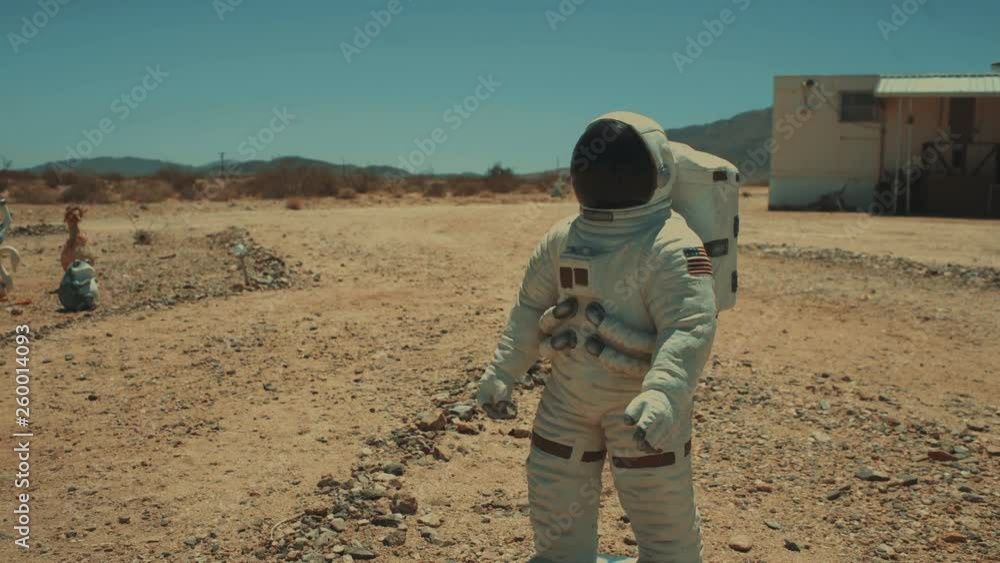 Statue of Astronaut in Hot Mojave desert, hot and sunny Statue of Astronaut in Hot Mojave desert, hot and sunny