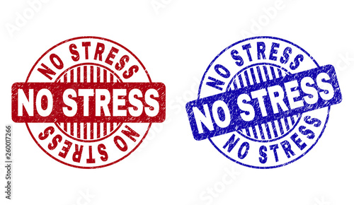 Grunge NO STRESS round stamp seals isolated on a white background. Round seals with grunge texture in red and blue colors. Vector rubber imitation of NO STRESS label inside circle form with stripes.