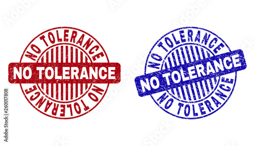 Grunge NO TOLERANCE round stamp seals isolated on a white background. Round seals with grunge texture in red and blue colors.