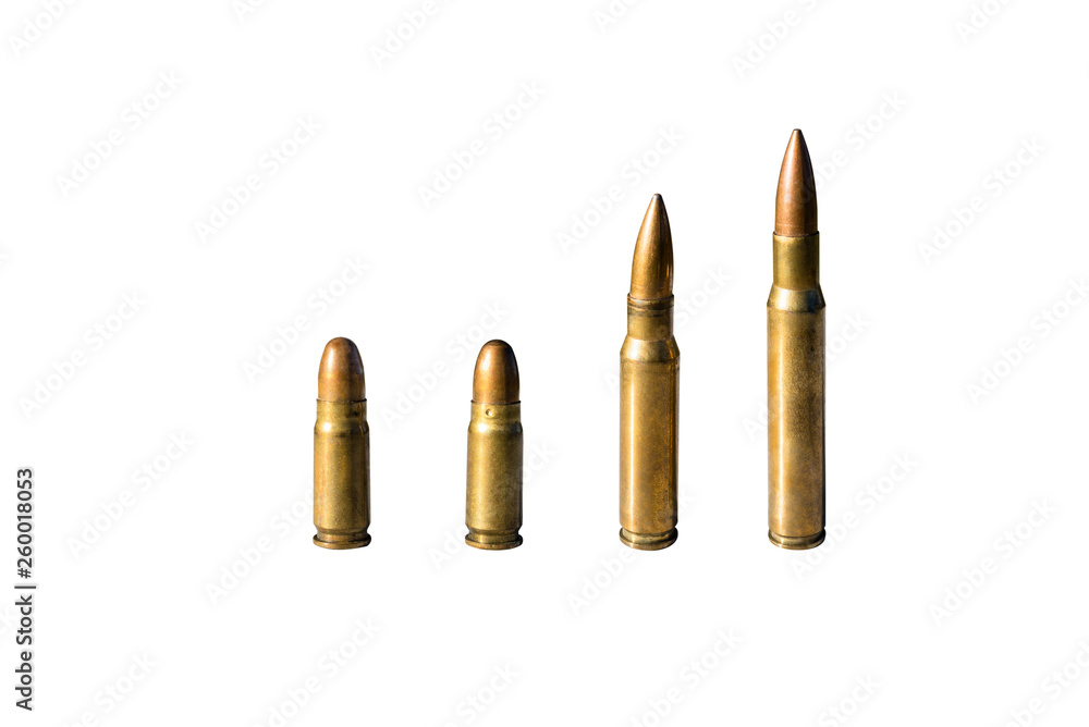 Four pieces of sharp ammunition with caliber 8mm and 12.7mm standing in a row, isolated on a white background with a clipping path and space for text. Four pieces of sharp ammunition with caliber 8mm and 12.7mm standing in a row, isolated on a white background with a clipping path and space for text.
