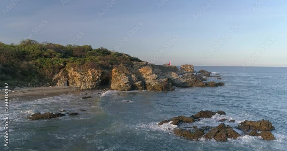 Aerial shot of the rock formations in Zicatela beach, Puerto Escondido, Oaxaca Aerial shot of the rock formations in Zicatela beach, Puerto Escondido, Oaxaca