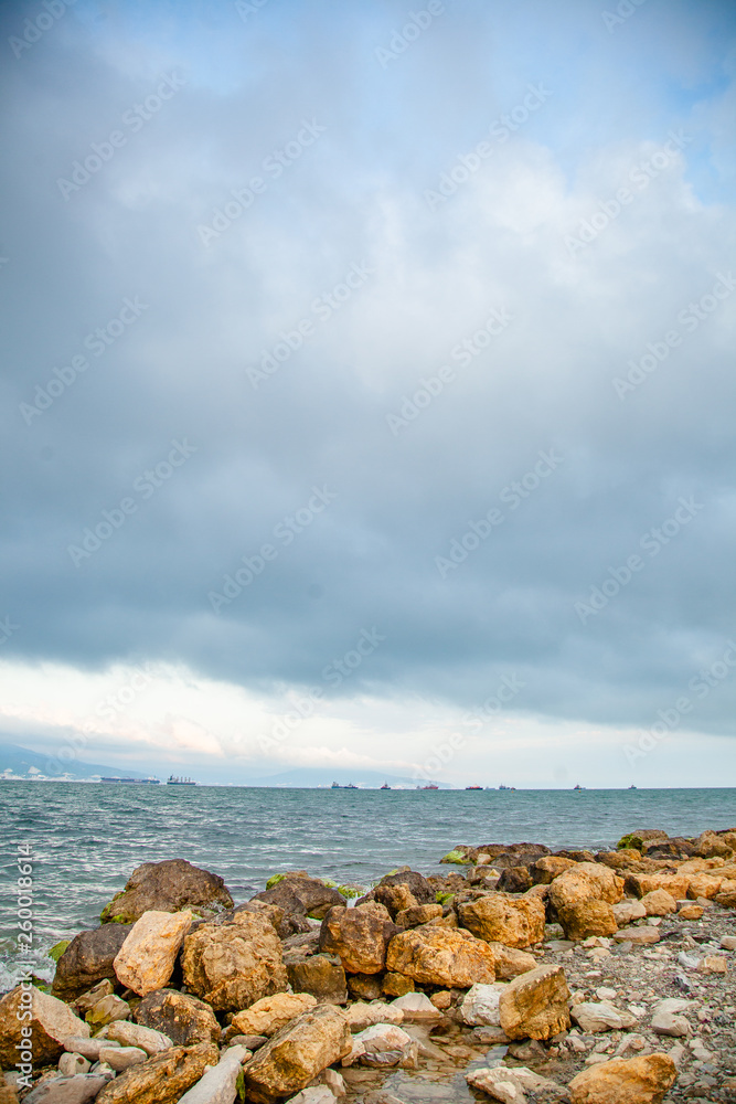 Stormy clouds under the Black sea. Themes bay in Novorossiysk in Krasnodar region, Russia. Image of sea trading port