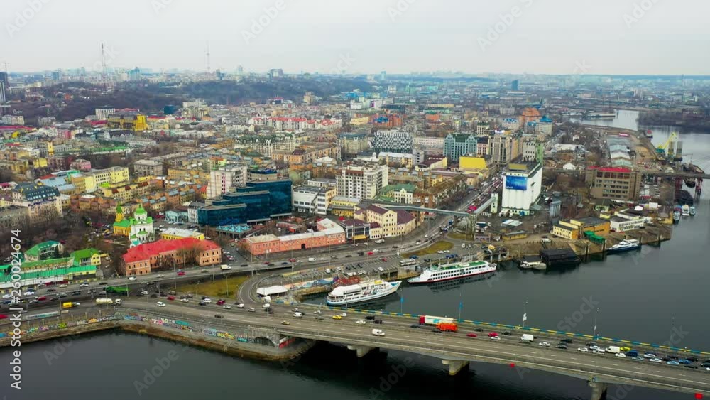 Aerial tripod, bridge over the Dnieper river in Kiev with lots of traffic. Aerial tripod, bridge over the Dnieper river in Kiev with lots of traffic.