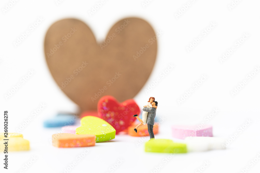 Miniature of a women and a man in love in front of heart sign with  copyspace, couple in love and pre-wedding background concept Stock Photo |  Adobe Stock