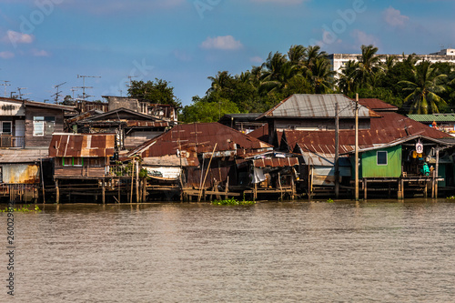 Poor dwellings on the Chao Phraya River near Bangkok, Thailand
