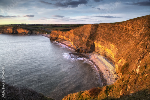 Dusk at Dunraven bay on the magnificent coastline of the Welsh Heritage Coast in South Wales, UK