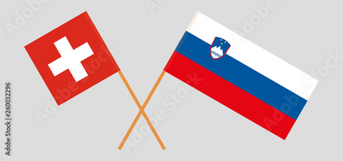 Slovenia and Switzerland. The Slovenian and Swiss flags. Official colors. Correct proportion. Vector illustration photo