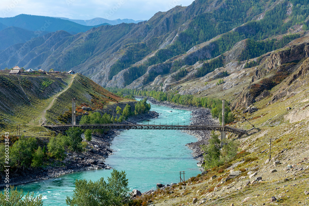 Bridge over the Katun river in the Altai mountains
