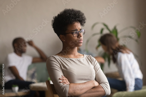 Upset african american student outcast bully victim suffer from discrimination photo