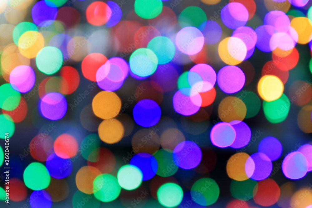 Multi color bokeh, Defocused light for christmas, new year and funny holiday background.