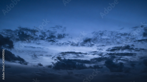 Dramatic evening sky at dusk with dark clouds gathering. © Barry
