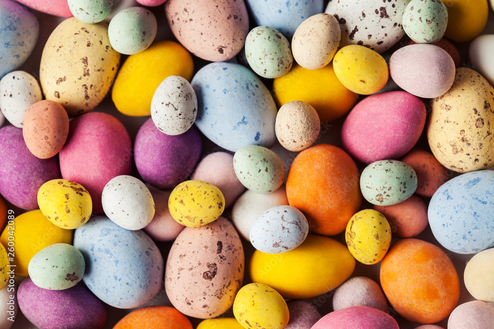 Easter background with colorful chocolate eggs Easter background with colorful chocolate eggs