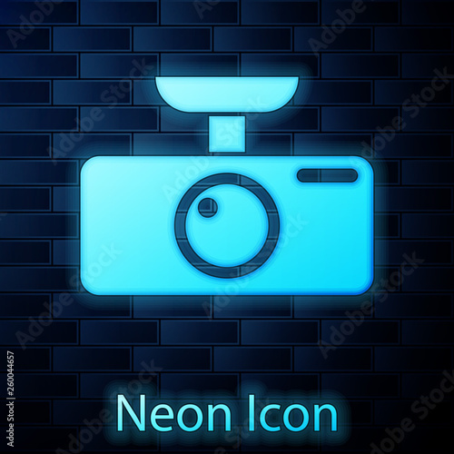 Glowing neon Car DVR icon isolated on brick wall background. Car digital video recorder icon. Vector Illustration