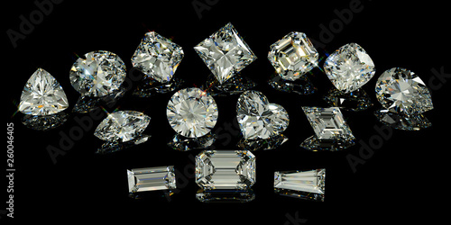 Multiple variously cut diamonds on black glossy background