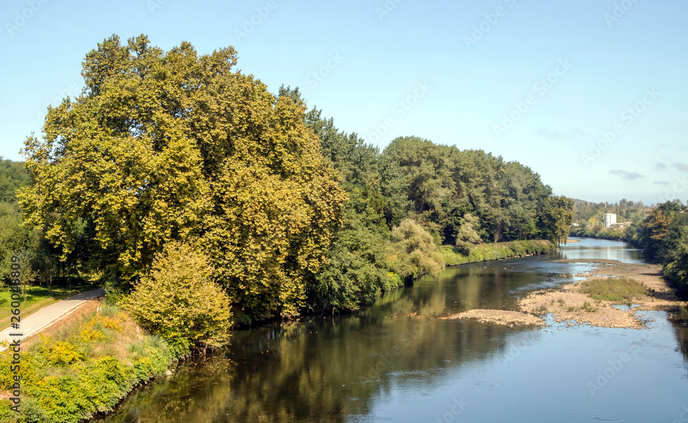 River in the forest of the north of Spain in a sunny day. River in the forest of the north of Spain in a sunny day.