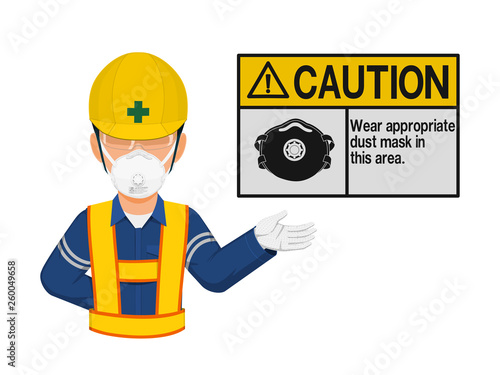 A worker with dust mask is presenting dust mask warming sign