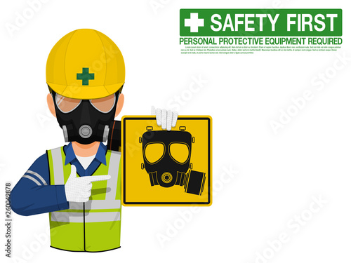A worker with respiratory mask is presenting respiratory mask sign