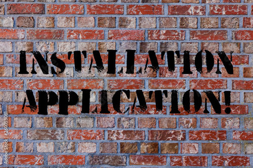 Text sign showing Installation Application. Business photo text setup of computer program including device drivers Brick Wall art like Graffiti motivational call written on the wall