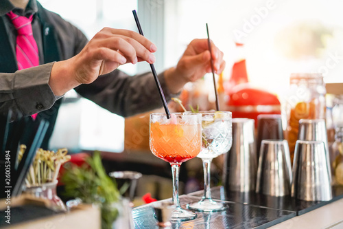Sticker Young bartender making cocktails at bar counter - Barman serving drinks - Work,