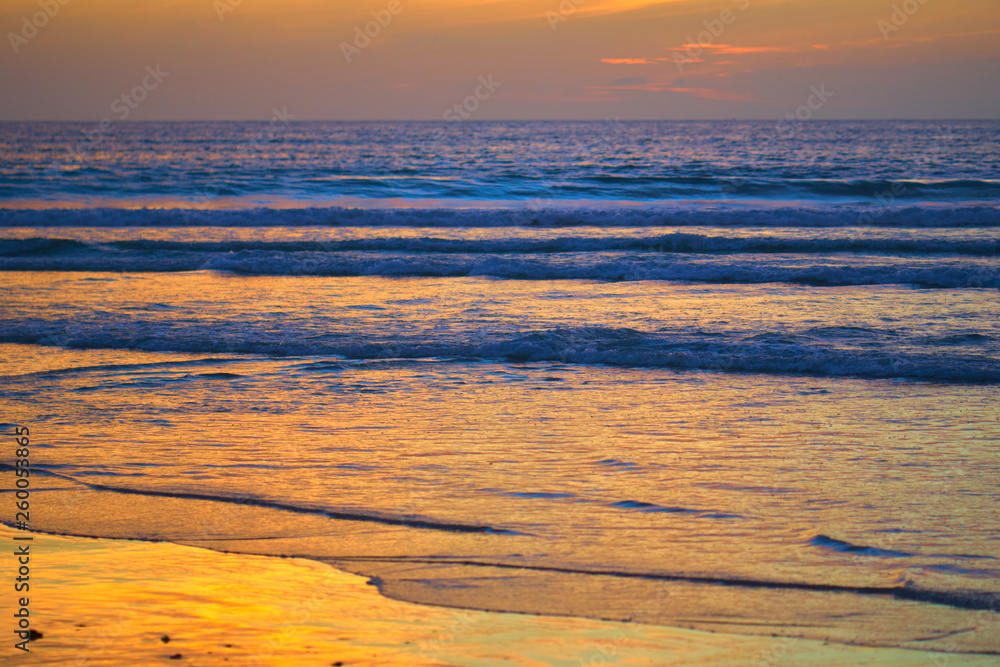 Obraz premium Incredibly colorful sunset on the tropical beach. Abstract natural background.