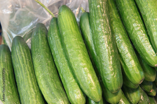 fresh green cucumber collection outdoor on market macro