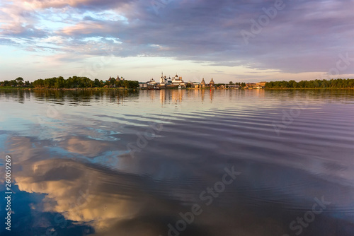 Solovetsky monastery is illuminated by  rays of the sun at sunset