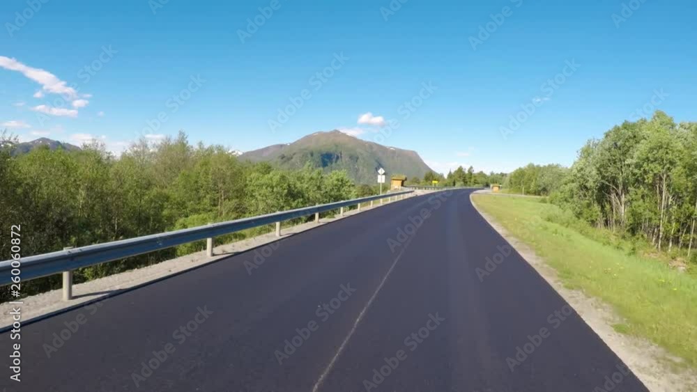 Driving a Car on a Road in Norway Driving a Car on a Road in Norway
