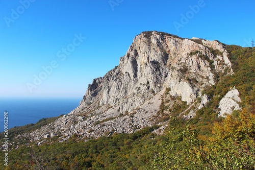 View of Foros Mountain above the autumn forest on the Crimean Peninsula. It s an unofficial name of the left part of Mshatka-Kaya mountain which indeed looks like an independent mountain.