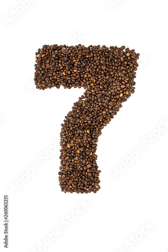 Number seven lined with coffee on white background