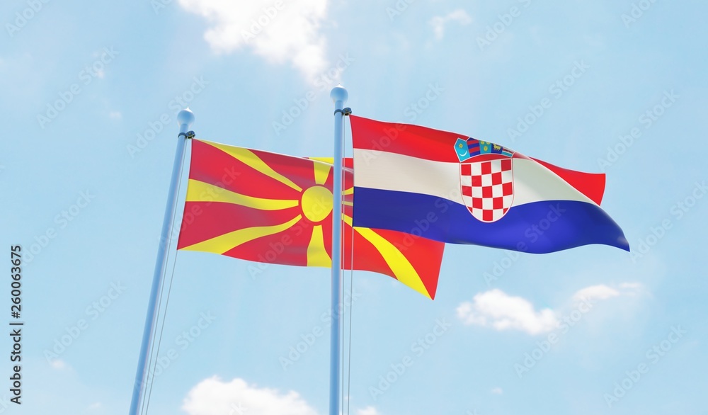 Croatia and Macedonia, two flags waving against blue sky. 3d image