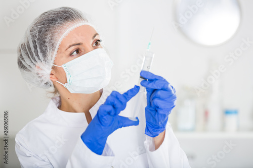 Nurse making injection