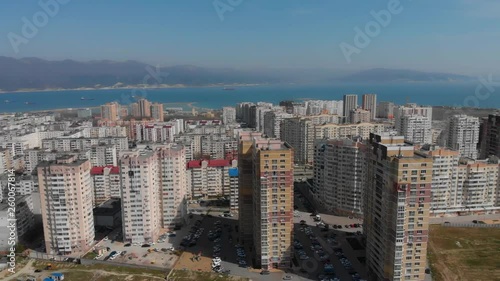 Aerial view of a 14 microdistrict on a early springday - camera rises photo