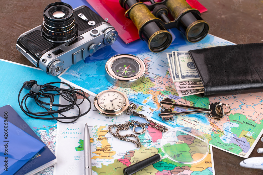 items and accessories for the traveler on the old background on the table items and accessories for the traveler on the old background on the table