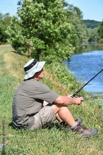 Man With Fishing Rod Outdoors