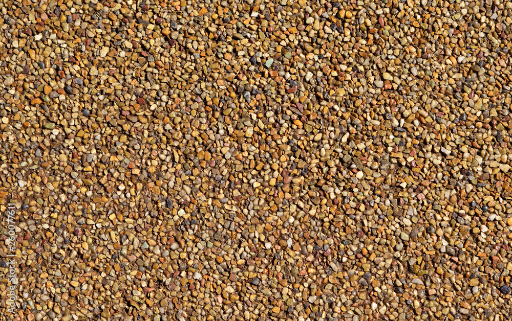 Paving with colorful stones and gravel as background