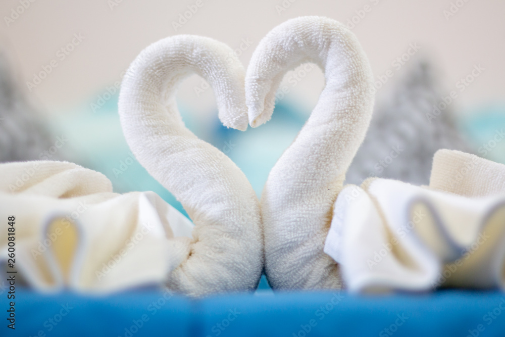 Obraz premium White towel, heart shape