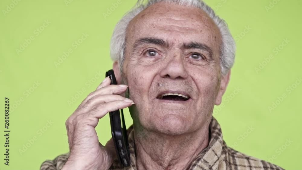 Senior Elderly Happy Man holding a smartphone , Close up Slow Motion Video Senior Elderly Happy Man holding a smartphone , Close up Slow Motion Video