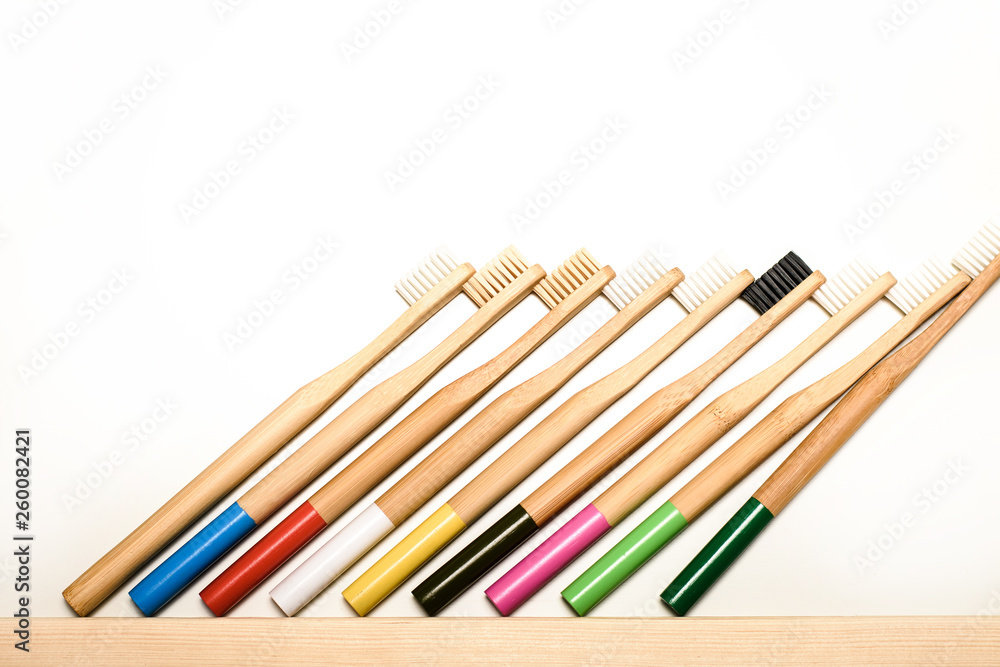 full colours bamboo toothbrushes on white background. Place for text. Ecoproduct. eco-friendly. full colours bamboo toothbrushes on white background. Place for text. Ecoproduct. eco-friendly.