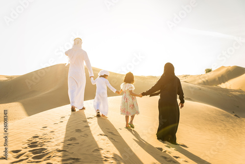 Arabian family in the desert