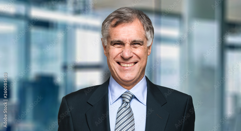Closeup portrait of a confident mature business man Closeup portrait of a confident mature business man