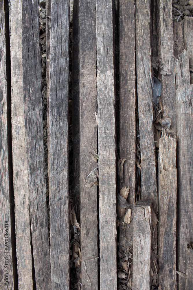 Wooden natural brown background with scars and patterns. Wooden slats. Burned Tree Wooden natural brown background with scars and patterns. Wooden slats. Burned Tree