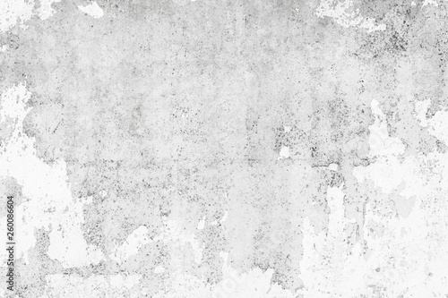 Wall fragment with scratches and cracks. Old concrete wall texture grunge background. Vintage or grungy white background of natural cement or stone old texture as a retro pattern wall.