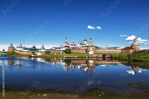 Spaso-Preobrazhensky the Solovetsky Stavropegial monastery with worship the cross in the bay of Well-being on the Bolshoy Solovetsky island in the White sea. Arkhangelsk region, Russia