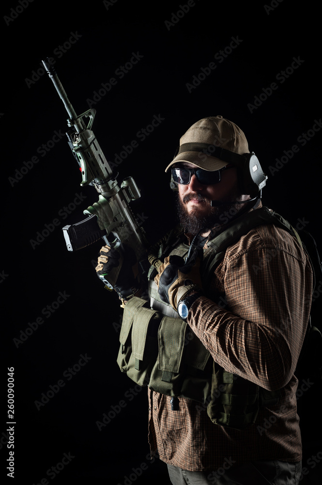 Armed soldier ready for battle. Military concept. Armed soldier ready for battle. Military concept.