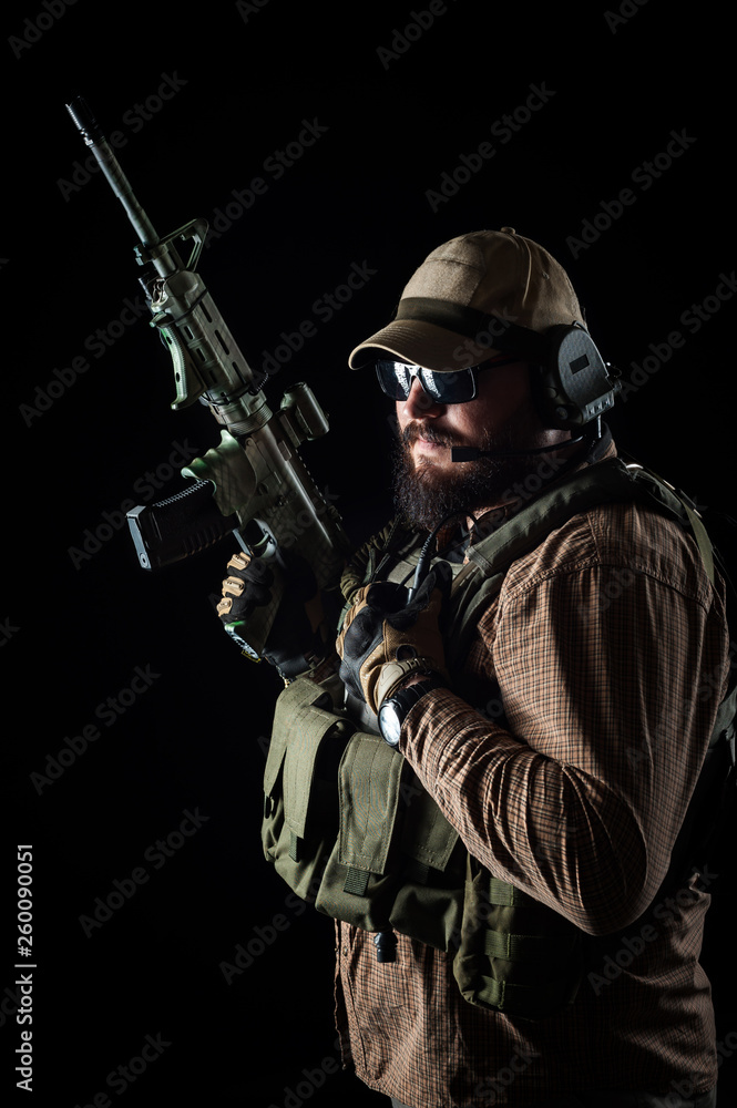 Armed soldier ready for battle. Military concept. Armed soldier ready for battle. Military concept.