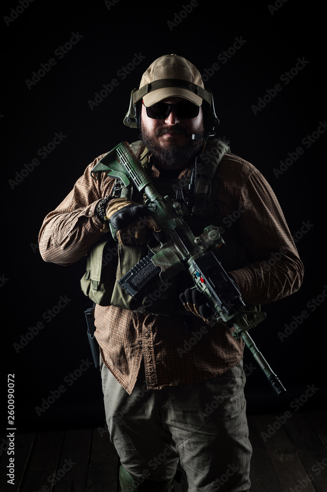 Armed soldier ready for battle. Military concept. Armed soldier ready for battle. Military concept.